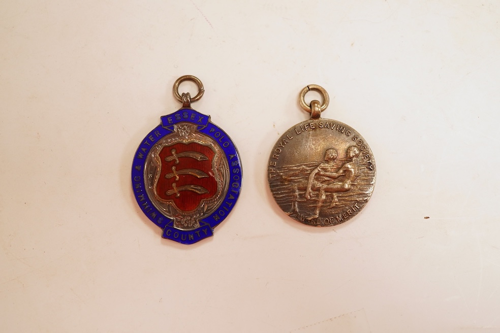 A quantity of assorted silver life-saving and swimming medals, early 20th century, cased